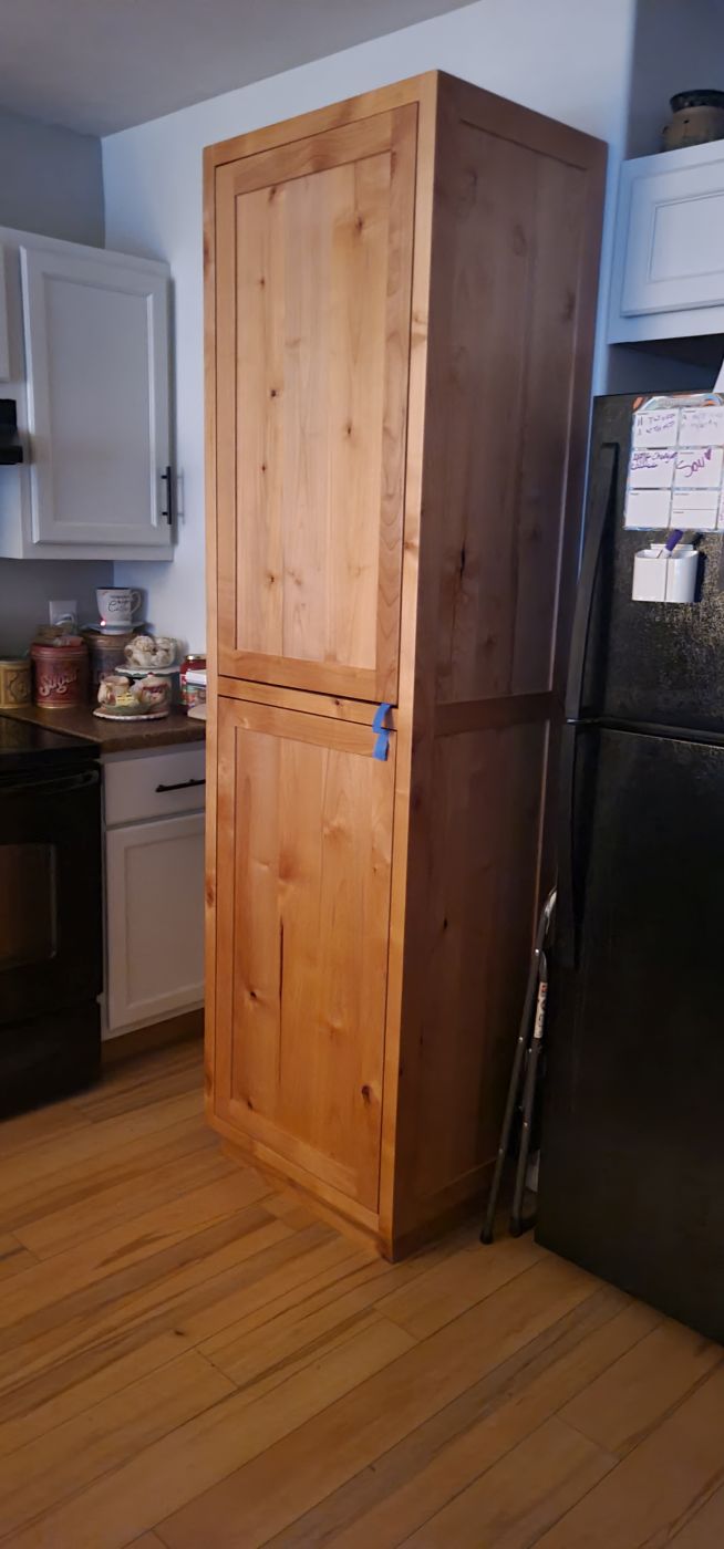 Knotty-pine pantry cabinet